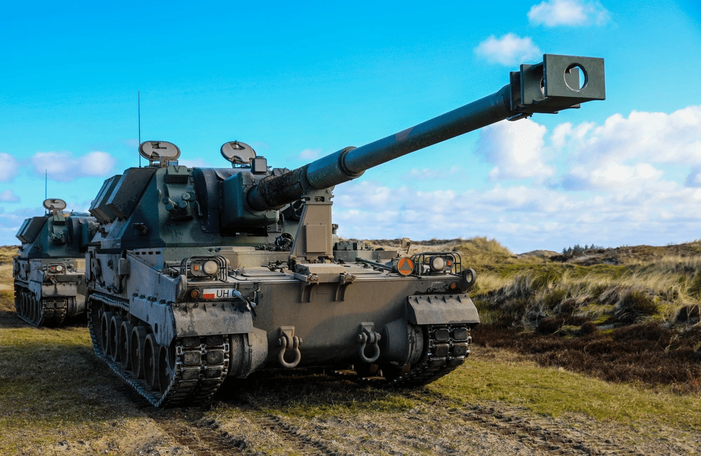 Polish soldiers assigned to the Multinational Field Artillery Brigade conduct calibration firing of the AHS Krab, a self-propelled tracked gun-howitzer, during Exercise Dynamic Front 23 at Oksbøl, Denmark, March 26, 2023.
